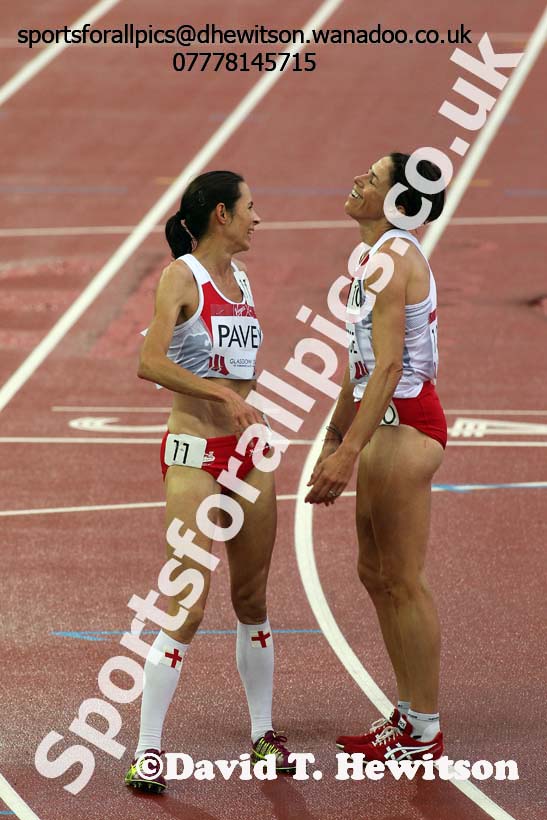 A joyful moment after Jo Pavey finishes 3rd with Helen Clitheroe (both England) womens 5000 metres at the Commonwealth Games, Glasgow. Photo: David T. Hewitson/Sports for All Pics